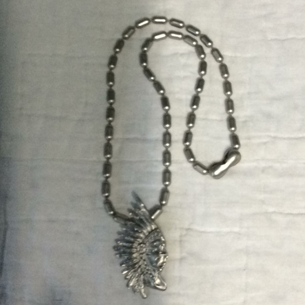 18” aluminum chain with Indian head pendant.